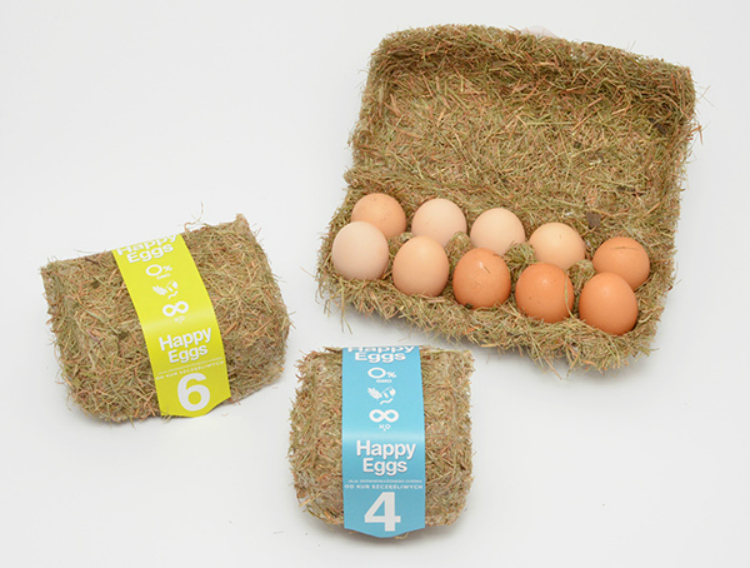 “Huevos felices” en este packaging cubierto de paja. Por Maja Szczypek